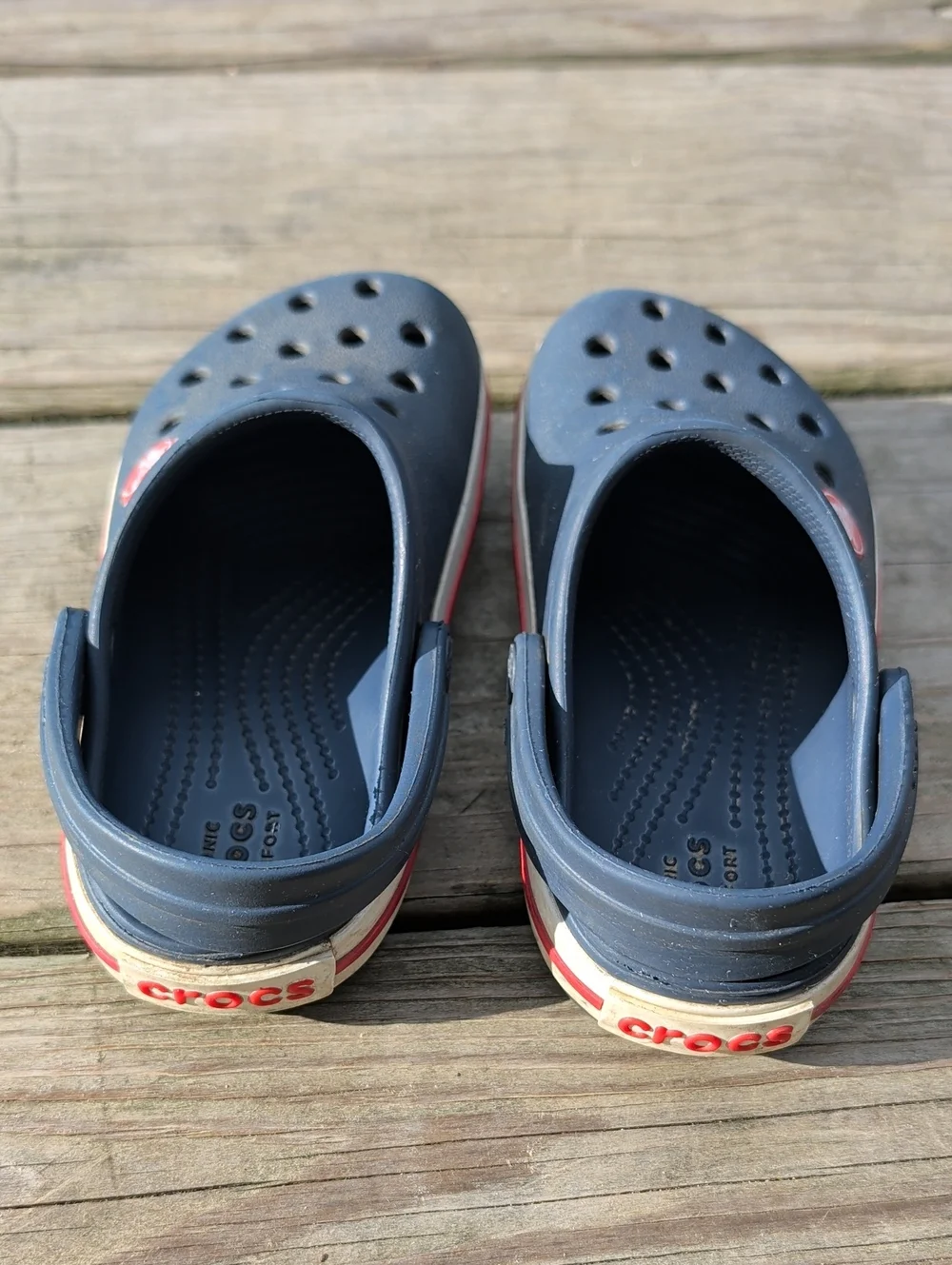 CROCS Kids Navy Clogs with Red Accents